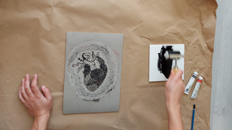 Limited edition cover - hands working on linoprinting